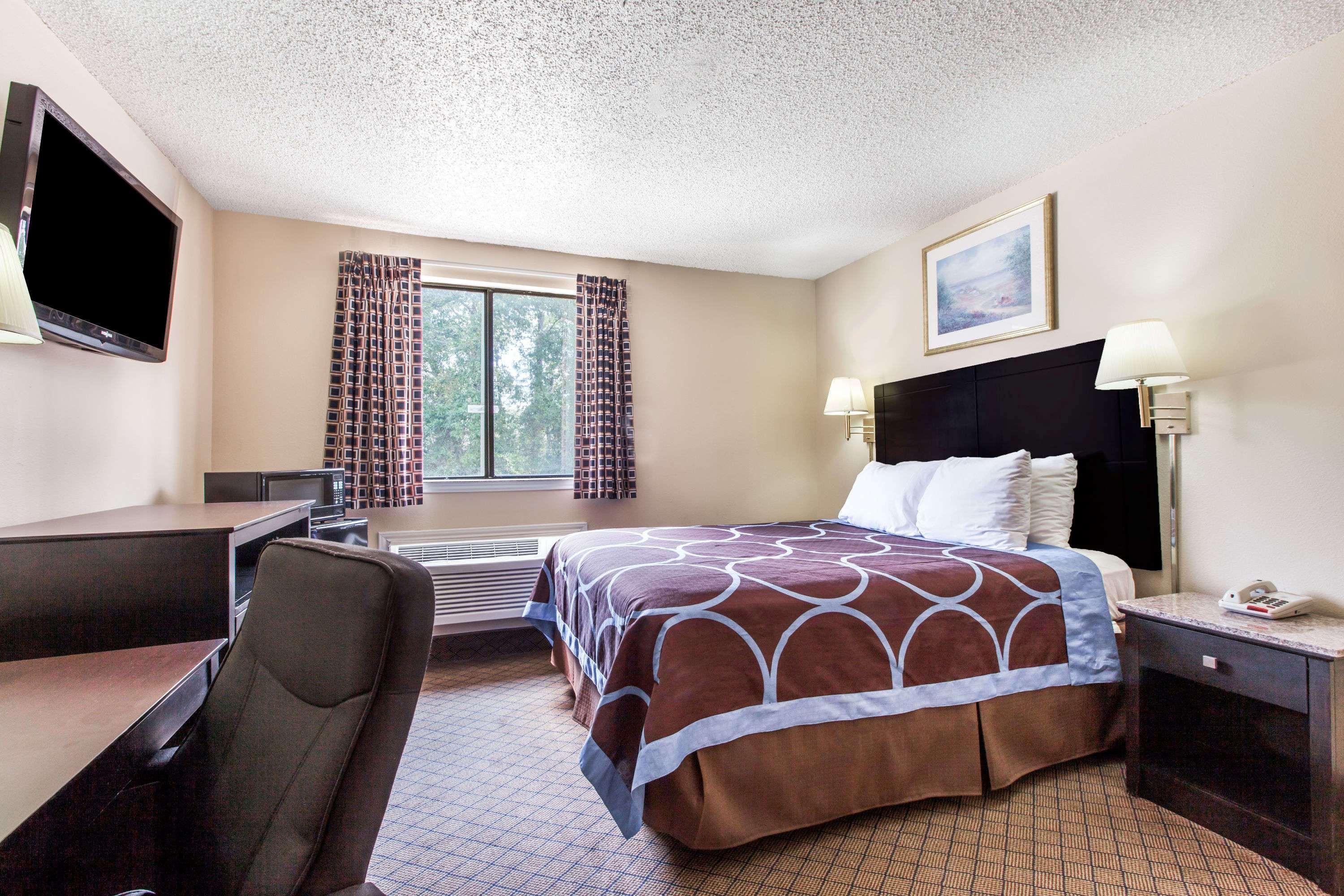 Hotel Super 8 By Wyndham Cleveland Tx Esterno foto